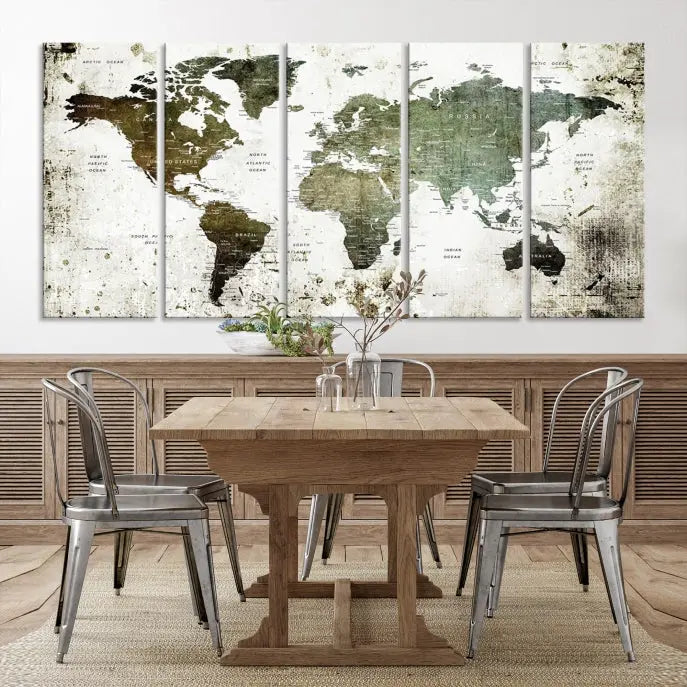 A Wall Art Push Pin World Map Canvas Print is displayed, showcasing an abstract world map in earthy tones. This museum-quality canvas is ready to hang and includes a UV-protective coating to maintain its vibrant shades.