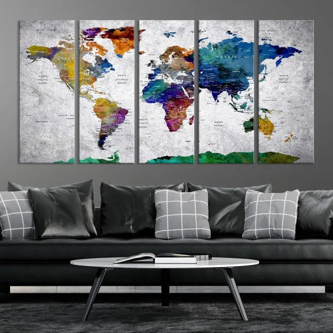 A three-panel, museum-quality Wall Art Push Pin World Map with Antarctica Canvas Print elegantly hangs, adding sophistication to the space.