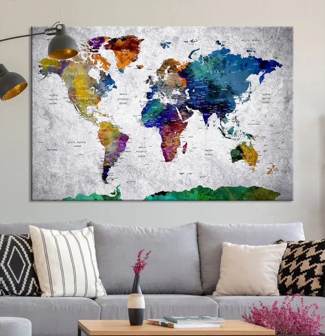 A three-panel, museum-quality Wall Art Push Pin World Map with Antarctica Canvas Print elegantly hangs, adding sophistication to the space.