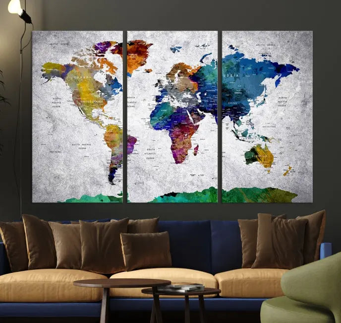 A three-panel, museum-quality Wall Art Push Pin World Map with Antarctica Canvas Print elegantly hangs, adding sophistication to the space.