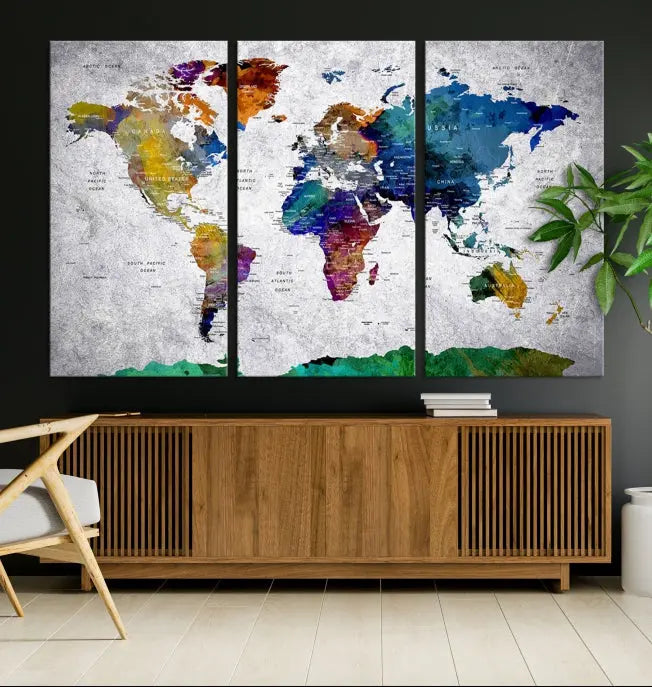 A three-panel, museum-quality Wall Art Push Pin World Map with Antarctica Canvas Print elegantly hangs, adding sophistication to the space.