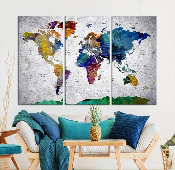 A three-panel, museum-quality Wall Art Push Pin World Map with Antarctica Canvas Print elegantly hangs, adding sophistication to the space.