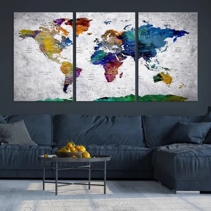 A three-panel, museum-quality Wall Art Push Pin World Map with Antarctica Canvas Print elegantly hangs, adding sophistication to the space.