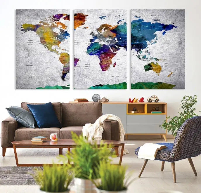 A three-panel, museum-quality Wall Art Push Pin World Map with Antarctica Canvas Print elegantly hangs, adding sophistication to the space.