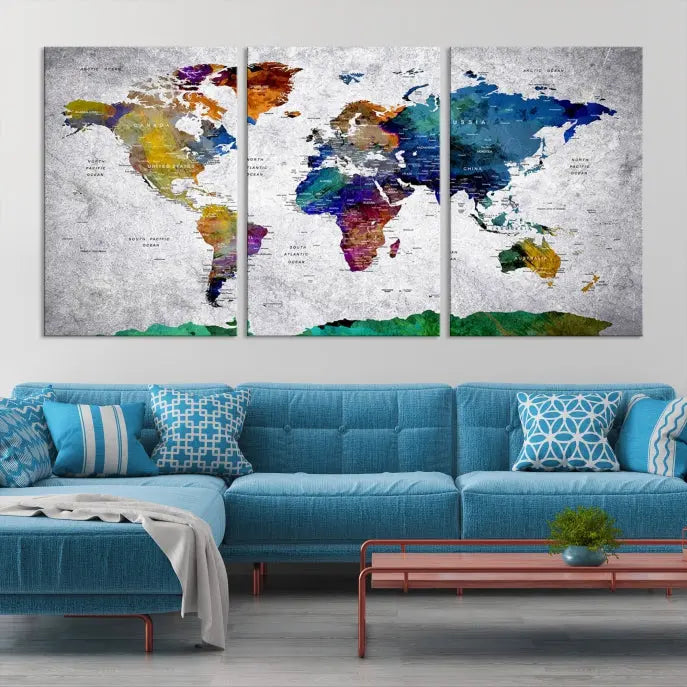 A three-panel, museum-quality Wall Art Push Pin World Map with Antarctica Canvas Print elegantly hangs, adding sophistication to the space.