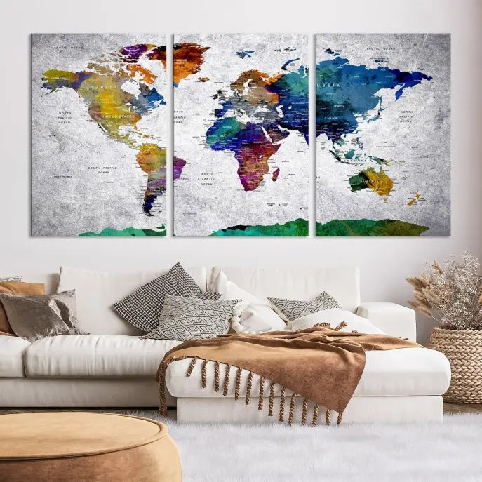 A three-panel, museum-quality Wall Art Push Pin World Map with Antarctica Canvas Print elegantly hangs, adding sophistication to the space.