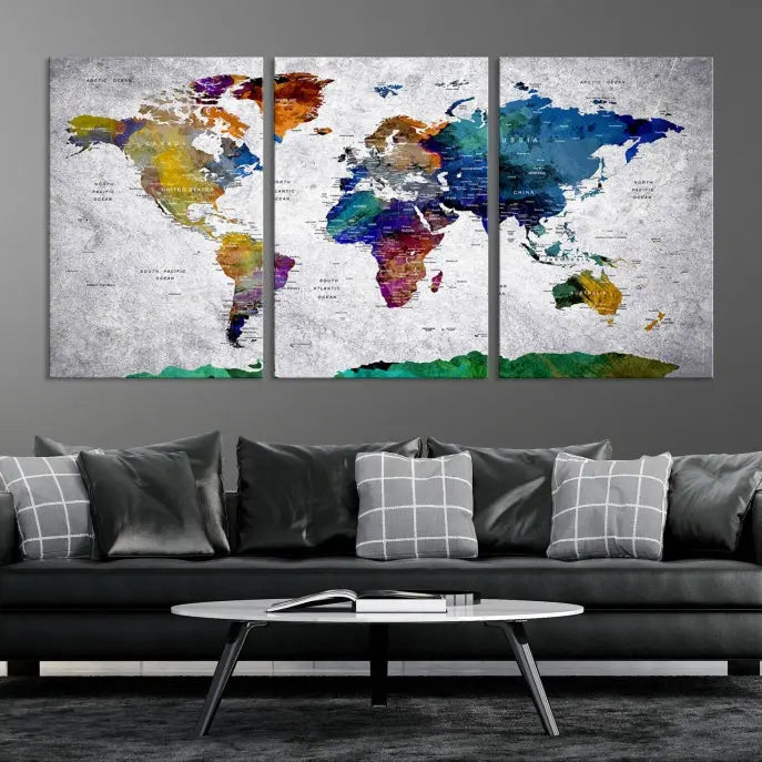 A three-panel, museum-quality Wall Art Push Pin World Map with Antarctica Canvas Print elegantly hangs, adding sophistication to the space.