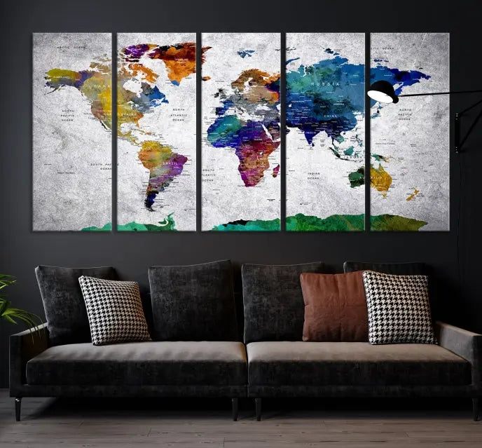 A three-panel, museum-quality Wall Art Push Pin World Map with Antarctica Canvas Print elegantly hangs, adding sophistication to the space.