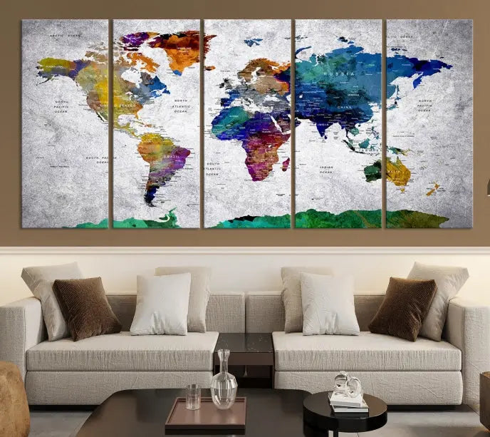 A three-panel, museum-quality Wall Art Push Pin World Map with Antarctica Canvas Print elegantly hangs, adding sophistication to the space.