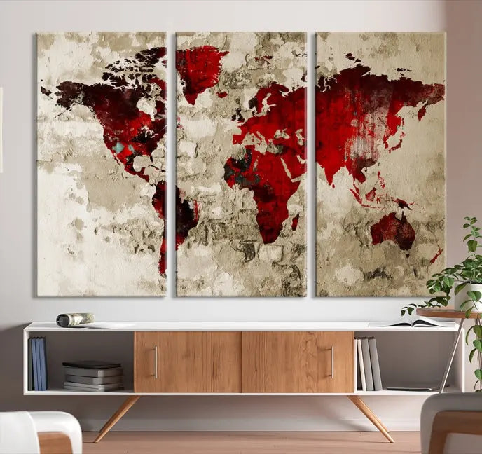 This eye-catching Wall Art Red Watercolor World Map Canvas Print, crafted on museum-quality canvas, showcases vibrant red continents across three panels. Ideal for enhancing a modern living room, it's ready to hang and infuse any space with its contemporary elegance.