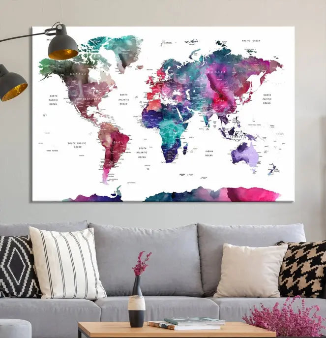 A Wall Art Watercolor Push Pin World Map Canvas Print features a gallery-wrapped design and UV-protective coating to maintain its vibrant colors.