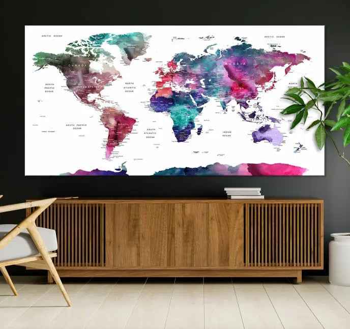 A Wall Art Watercolor Push Pin World Map Canvas Print features a gallery-wrapped design and UV-protective coating to maintain its vibrant colors.