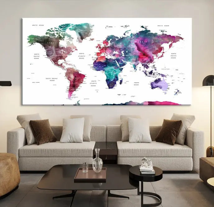 A Wall Art Watercolor Push Pin World Map Canvas Print features a gallery-wrapped design and UV-protective coating to maintain its vibrant colors.