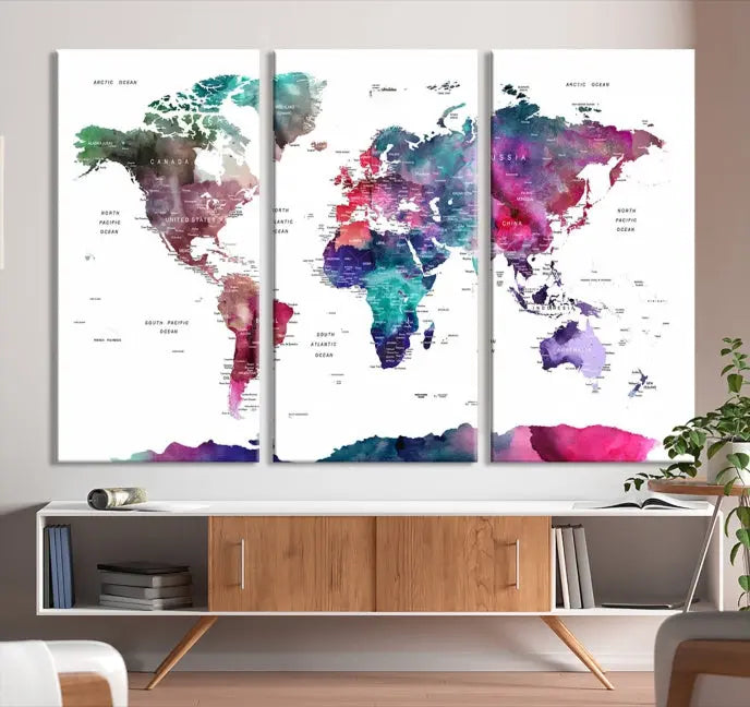 A Wall Art Watercolor Push Pin World Map Canvas Print features a gallery-wrapped design and UV-protective coating to maintain its vibrant colors.