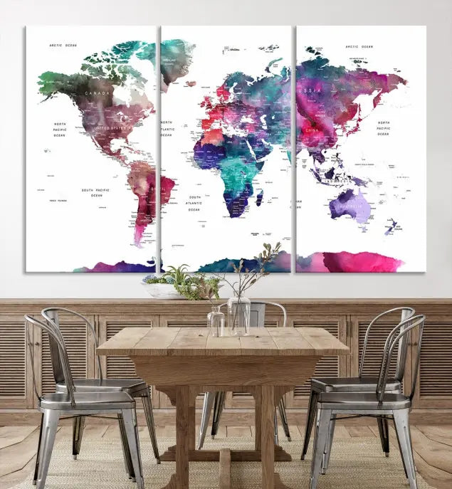 A Wall Art Watercolor Push Pin World Map Canvas Print features a gallery-wrapped design and UV-protective coating to maintain its vibrant colors.