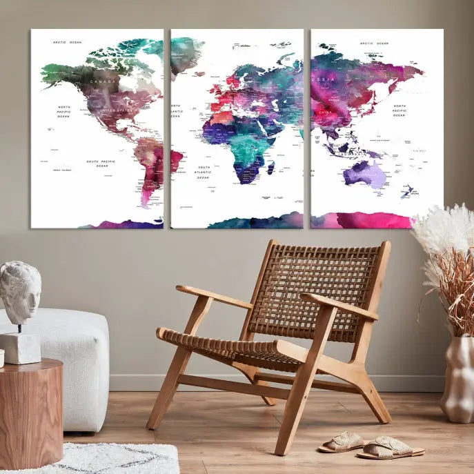 A Wall Art Watercolor Push Pin World Map Canvas Print features a gallery-wrapped design and UV-protective coating to maintain its vibrant colors.