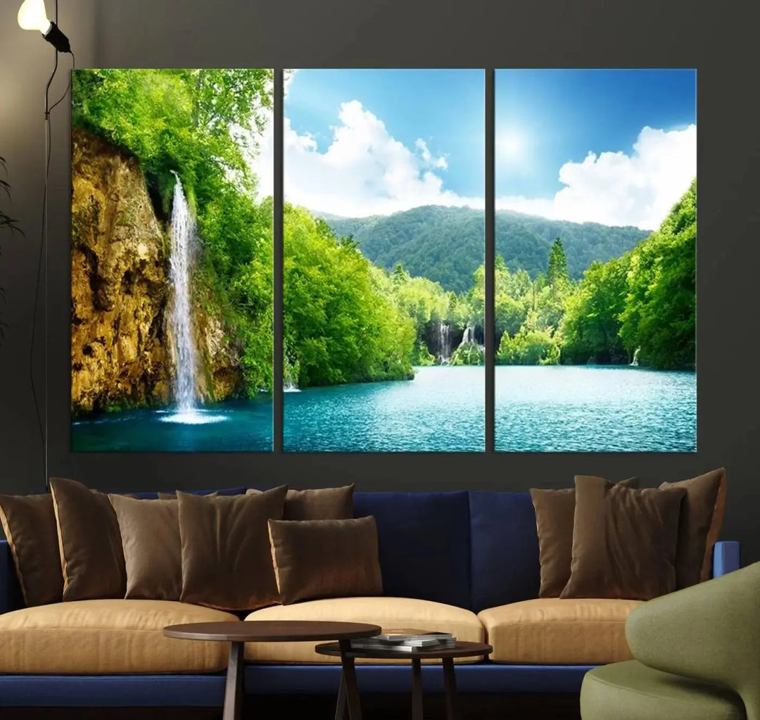 A triptych of big waterfalls in a forest with a mountain view, printed on museum-quality canvas with a UV-protective coating, is ready to elevate your space.