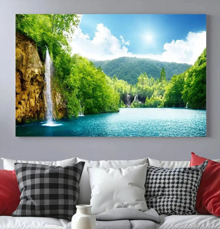 A triptych of big waterfalls in a forest with a mountain view, printed on museum-quality canvas with a UV-protective coating, is ready to elevate your space.