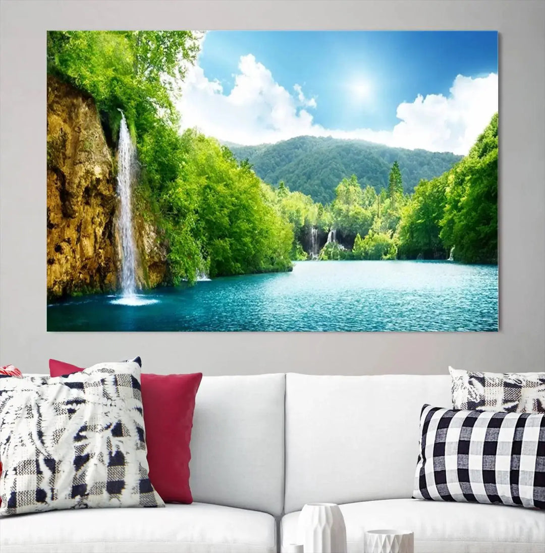 A triptych of big waterfalls in a forest with a mountain view, printed on museum-quality canvas with a UV-protective coating, is ready to elevate your space.