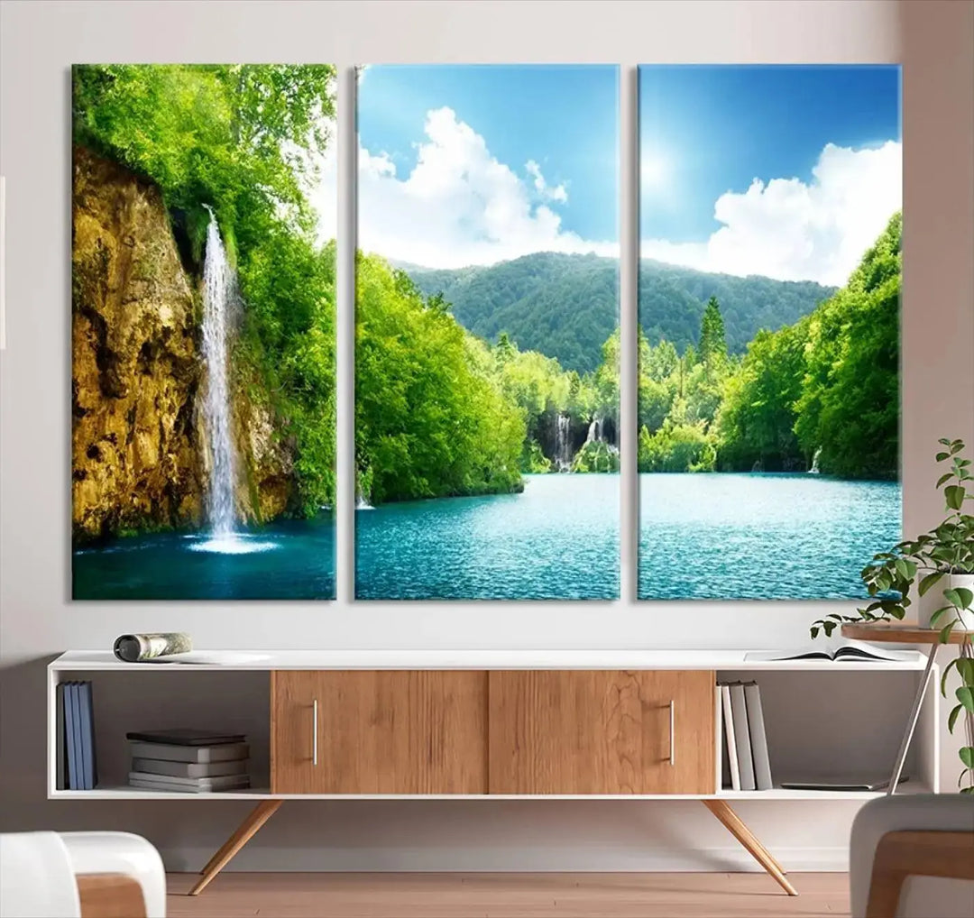 A triptych of big waterfalls in a forest with a mountain view, printed on museum-quality canvas with a UV-protective coating, is ready to elevate your space.