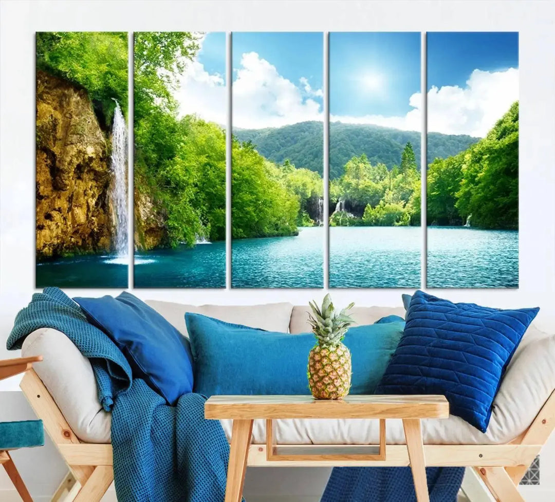 A triptych of big waterfalls in a forest with a mountain view, printed on museum-quality canvas with a UV-protective coating, is ready to elevate your space.