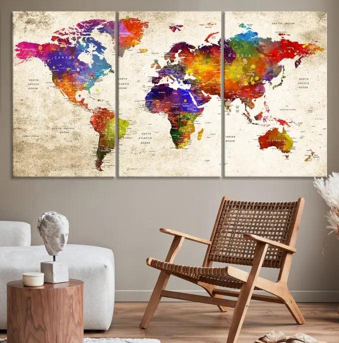 The Wall Art World Map Canvas Print features a three-panel design with vibrant colors and is coated with UV protection for museum quality, creating a stunning focal point in an elegantly styled, neutral-toned living room.