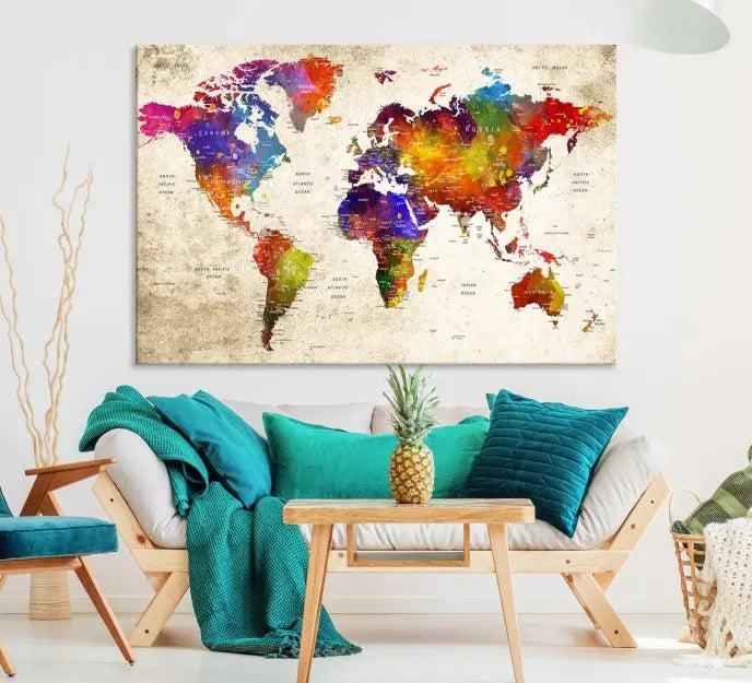 The Wall Art World Map Canvas Print features a three-panel design with vibrant colors and is coated with UV protection for museum quality, creating a stunning focal point in an elegantly styled, neutral-toned living room.