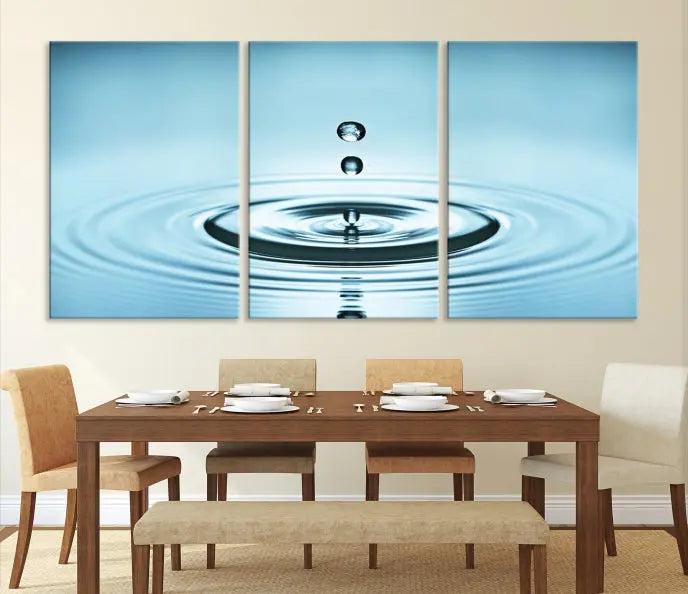 Modern living room featuring the "Water Drop Wall Art Canvas Print" depicting water droplets above ripples on museum-quality canvas on the wall.