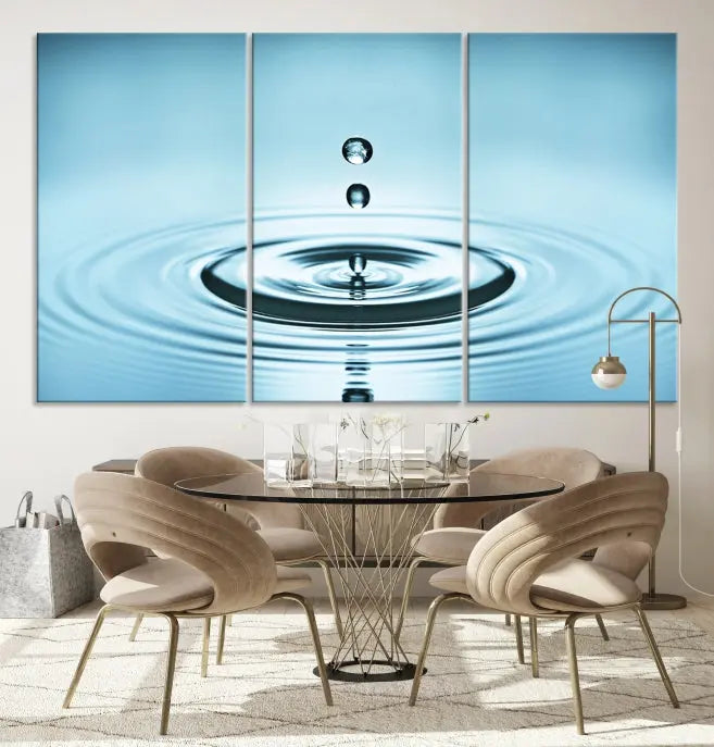 A modern living room showcases a gallery-wrapped triptych of the Water Droplet Wall Art Canvas Print.