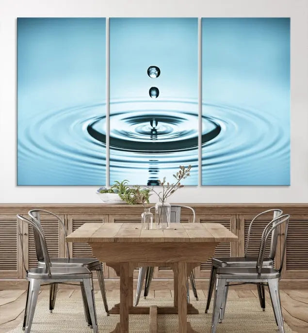 A modern living room showcases a gallery-wrapped triptych of the Water Droplet Wall Art Canvas Print.