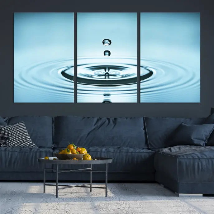 A modern living room showcases a gallery-wrapped triptych of the Water Droplet Wall Art Canvas Print.