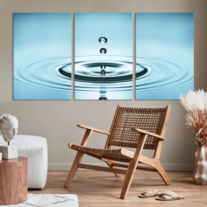 A modern living room showcases a gallery-wrapped triptych of the Water Droplet Wall Art Canvas Print.