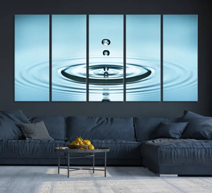 A modern living room showcases a gallery-wrapped triptych of the Water Droplet Wall Art Canvas Print.