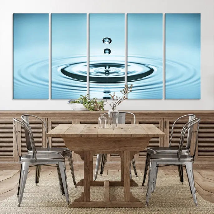 A modern living room showcases a gallery-wrapped triptych of the Water Droplet Wall Art Canvas Print.