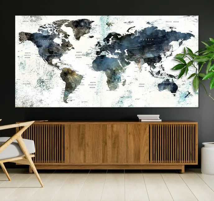 The "Watercolor Push Pin World Map Wall Art Canvas Print" displayed on the wall is a triptych crafted with museum-quality canvases. It contributes to the elegant ambiance with its modern and minimalist decor, featuring a UV-protective coating to maintain its vibrant allure.