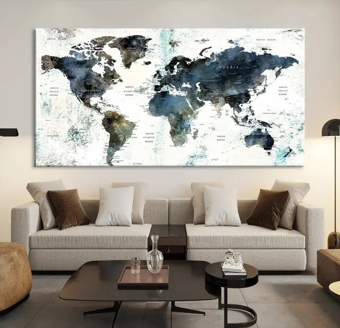 The "Watercolor Push Pin World Map Wall Art Canvas Print" displayed on the wall is a triptych crafted with museum-quality canvases. It contributes to the elegant ambiance with its modern and minimalist decor, featuring a UV-protective coating to maintain its vibrant allure.