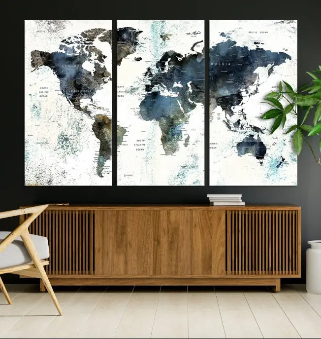 The "Watercolor Push Pin World Map Wall Art Canvas Print" displayed on the wall is a triptych crafted with museum-quality canvases. It contributes to the elegant ambiance with its modern and minimalist decor, featuring a UV-protective coating to maintain its vibrant allure.