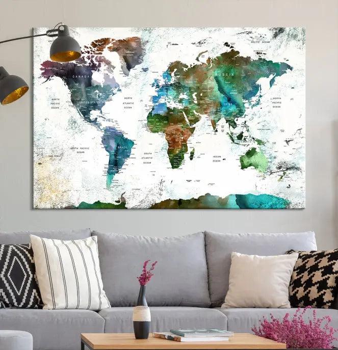 A cozy living room showcasing the Watercolor World Map Canvas Print.