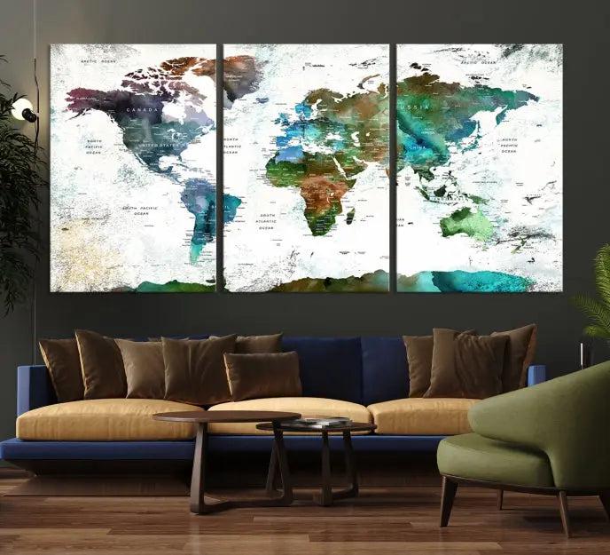 A cozy living room showcasing the Watercolor World Map Canvas Print.