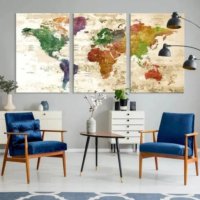 The living room showcases the Watercolor World Map Wall Art Canvas Print on the wall. This museum-quality canvas is ready to hang and is coated with UV protection for lasting vibrance and elegance.