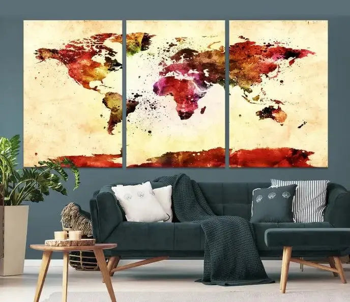 The "Watercolor World Map Wall Art Canvas Print" features three panels in vibrant colors on a gallery-wrapped, museum-quality canvas with UV-protective coating, decorating the wall.