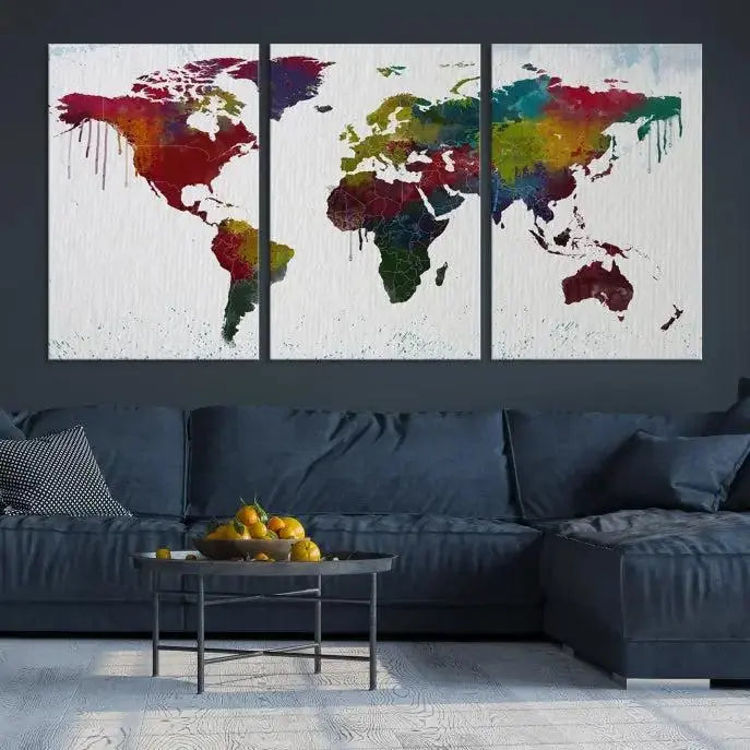 The "Watercolor World Map Wall Art Canvas Print" adds a burst of color to the gallery-wrapped triptych canvas. This museum-quality piece features a UV-protective coating that ensures its vibrant hues endure.