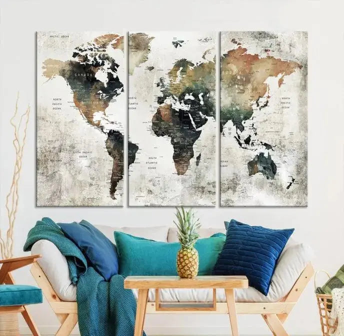 The dark wall is elegantly adorned with the Watercolor World Map Wall Art Canvas Print in a triptych style. Each canvas features a UV-protective coating and is ready to hang, seamlessly blending sophistication with practicality.