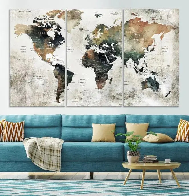 The dark wall is elegantly adorned with the Watercolor World Map Wall Art Canvas Print in a triptych style. Each canvas features a UV-protective coating and is ready to hang, seamlessly blending sophistication with practicality.