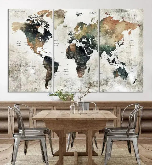 The dark wall is elegantly adorned with the Watercolor World Map Wall Art Canvas Print in a triptych style. Each canvas features a UV-protective coating and is ready to hang, seamlessly blending sophistication with practicality.