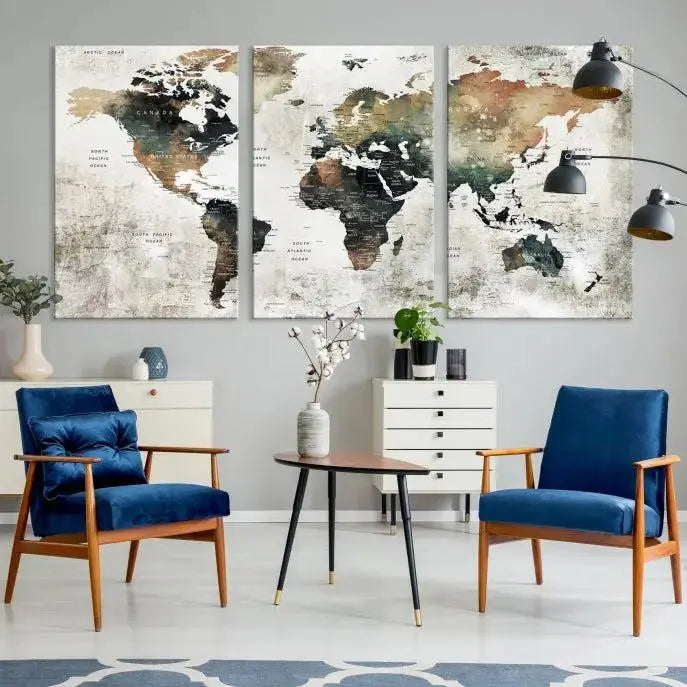 The dark wall is elegantly adorned with the Watercolor World Map Wall Art Canvas Print in a triptych style. Each canvas features a UV-protective coating and is ready to hang, seamlessly blending sophistication with practicality.