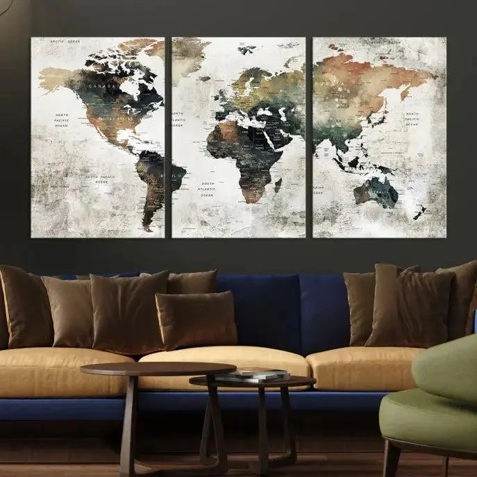 The dark wall is elegantly adorned with the Watercolor World Map Wall Art Canvas Print in a triptych style. Each canvas features a UV-protective coating and is ready to hang, seamlessly blending sophistication with practicality.