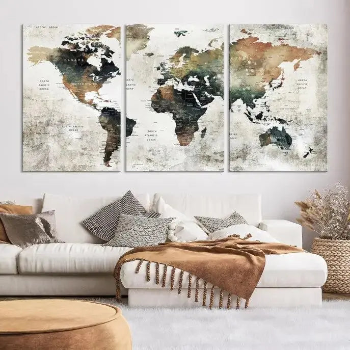 The dark wall is elegantly adorned with the Watercolor World Map Wall Art Canvas Print in a triptych style. Each canvas features a UV-protective coating and is ready to hang, seamlessly blending sophistication with practicality.