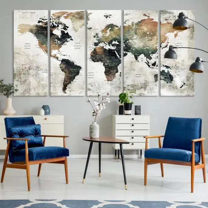 The dark wall is elegantly adorned with the Watercolor World Map Wall Art Canvas Print in a triptych style. Each canvas features a UV-protective coating and is ready to hang, seamlessly blending sophistication with practicality.