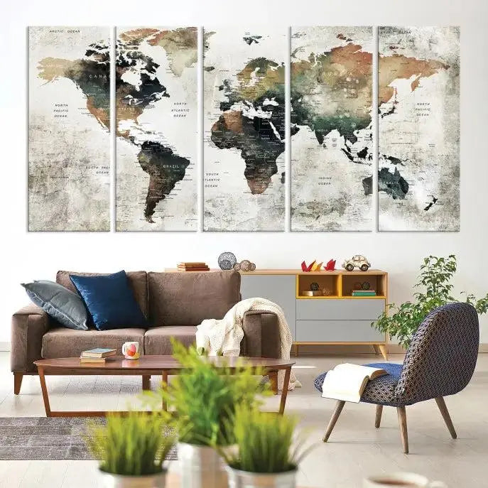 The dark wall is elegantly adorned with the Watercolor World Map Wall Art Canvas Print in a triptych style. Each canvas features a UV-protective coating and is ready to hang, seamlessly blending sophistication with practicality.